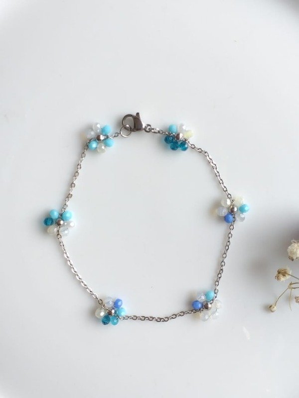 Producto - AQP0164 Pulsera Flores cristal Celestes