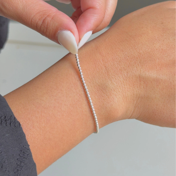 Producto - Pulsera elástica pelotitas