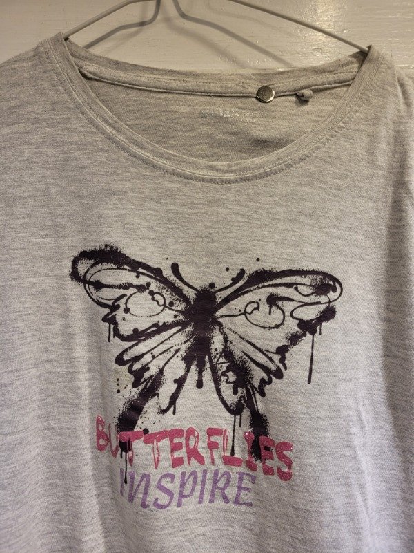 Producto - Remera INDEX gris logo mariposa Talle 12 años - PRECIO: 10X - 2