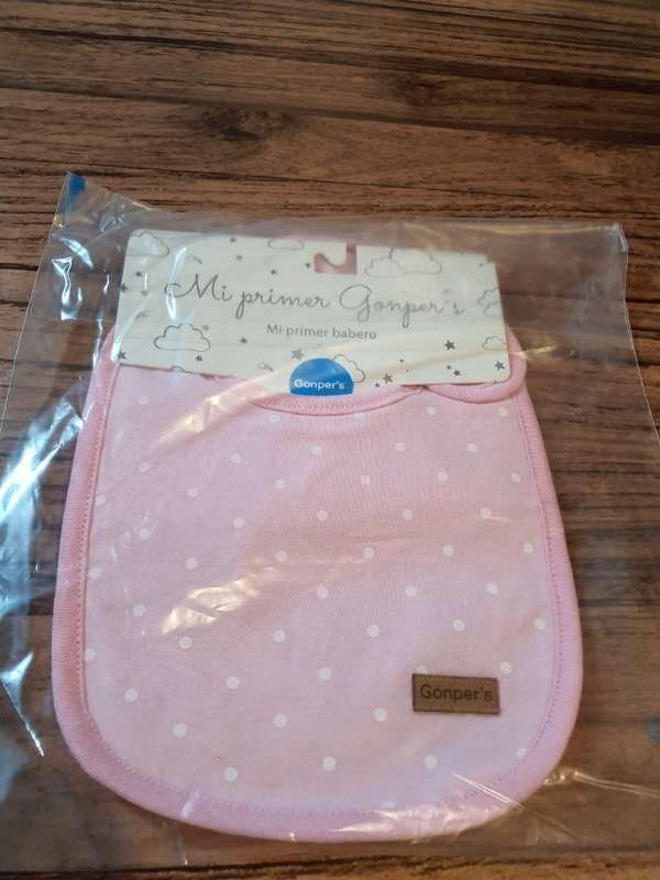 Producto - Babero impermeable rosa lunares