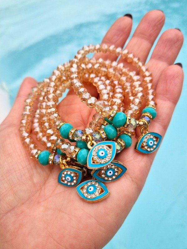 Producto - PULSERA CRISTAL Y STRASS CON OJITO ESMALTADO CARAMELO/AQUA