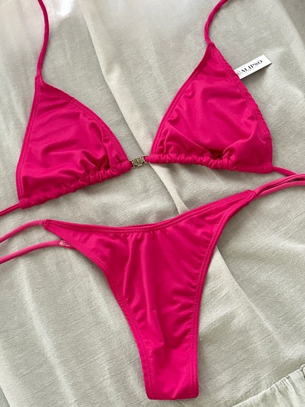 Producto - BK MACA CON DIJE DE OSTRA FUCSIA