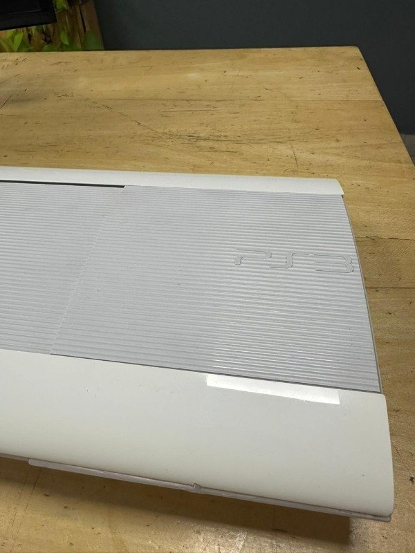 Producto - Playstation 3 Super Slim Blanca con Joystick y Juego - 4