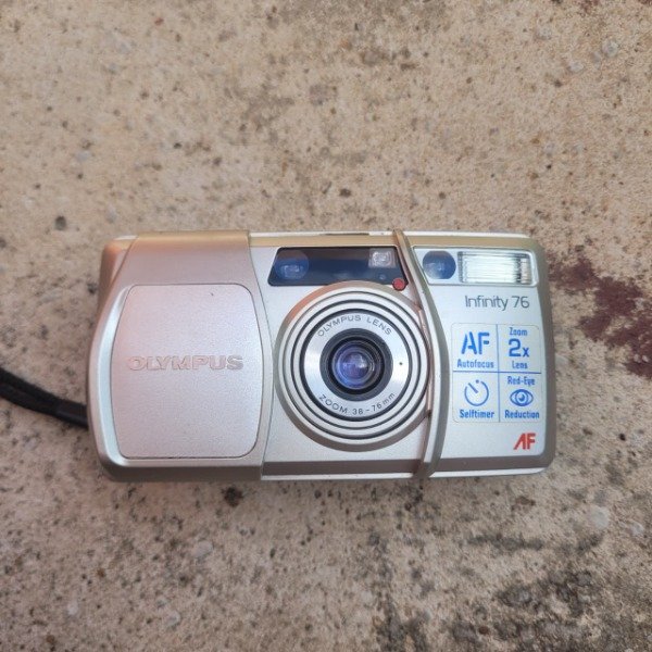 Producto - Olympus Infinity Zoom 76