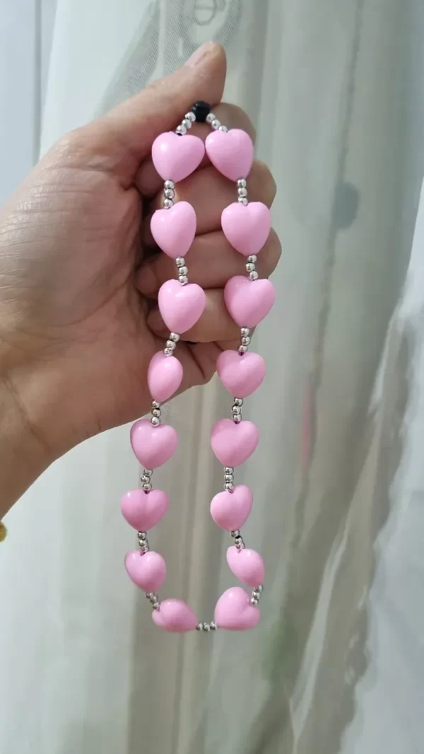 Producto - Phone strap cora rosa