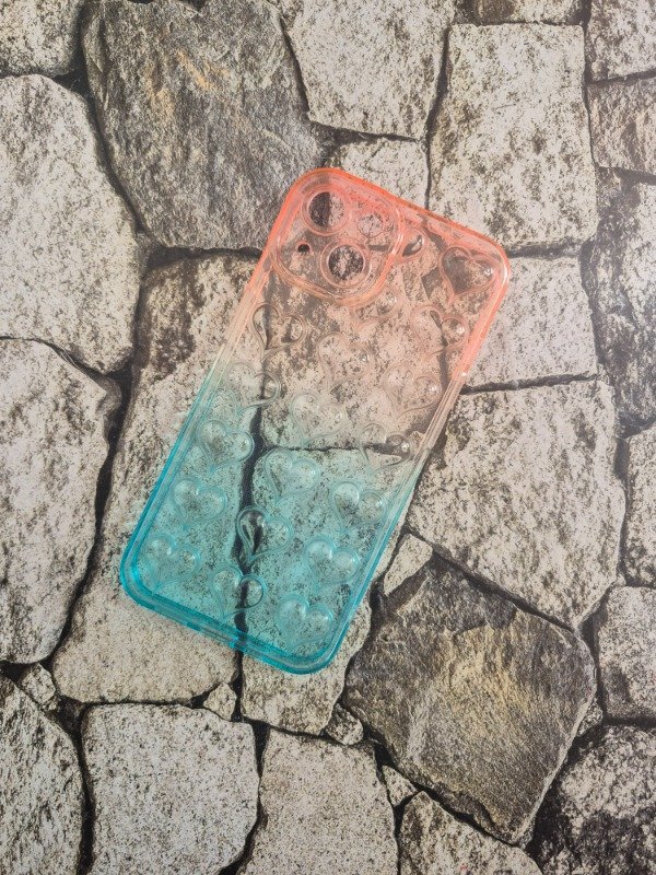 Producto - Funda tpu puffer corazon Iphone 13 naranja celeste