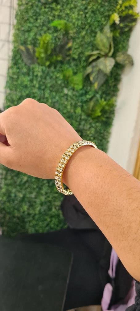 Producto - Pulsera doble brillos dorado.