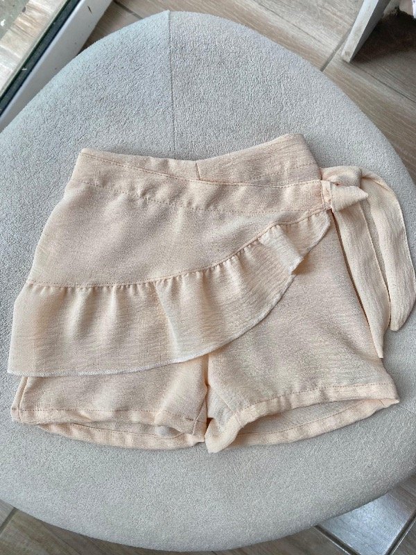 Short pollera crema