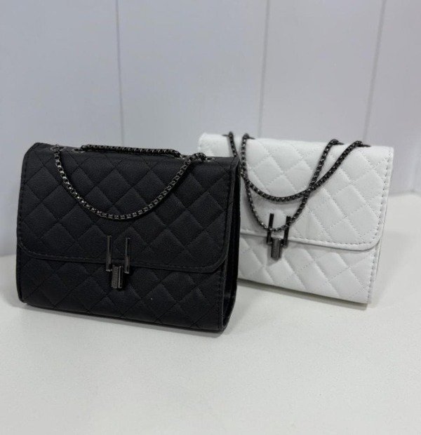 Producto - CARTERA VERSATIL ORYX BOTON METAL