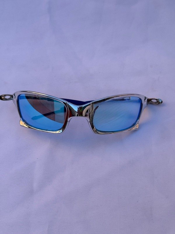 Producto - LENTES BR METAL PLATEADO CON CELESTE