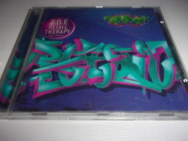 Producto - CD T.D.F. RETAIL THERAPY USA DOWNTEMPO ELECTRONIC 44C