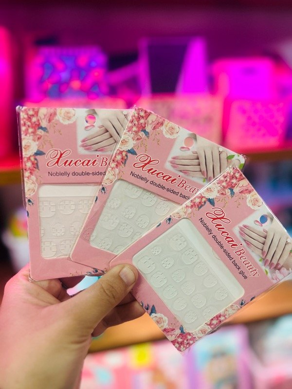 Producto - Adhesivo para uñas podtizas