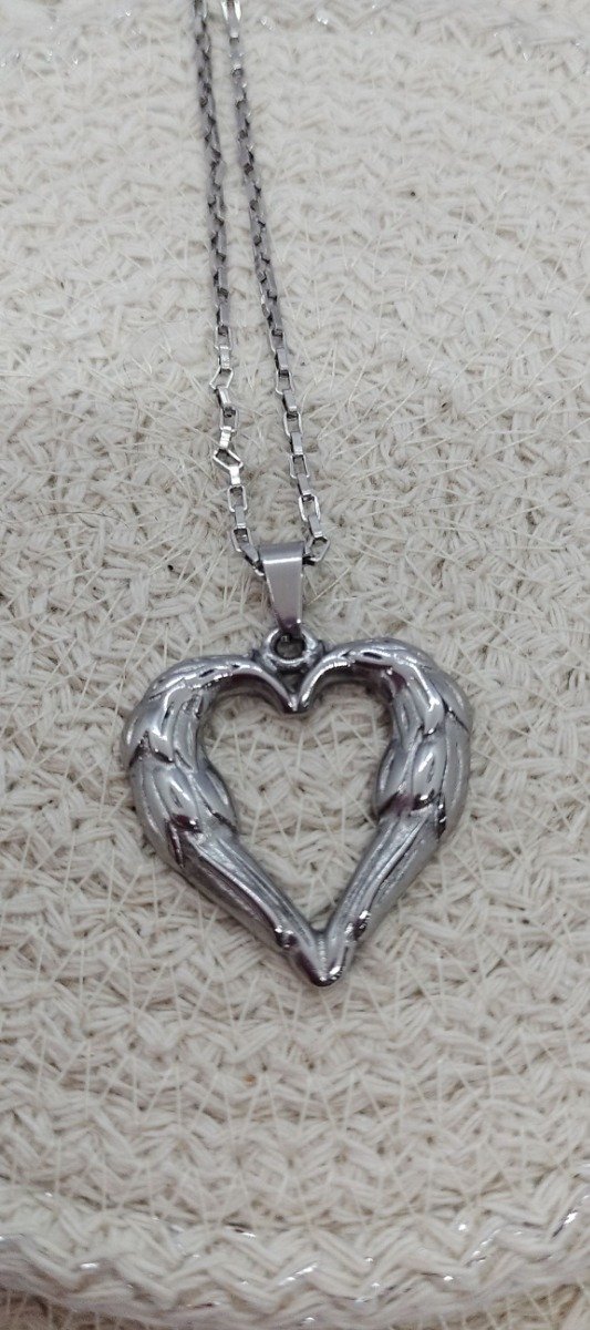 Producto - Corazón formado por alas