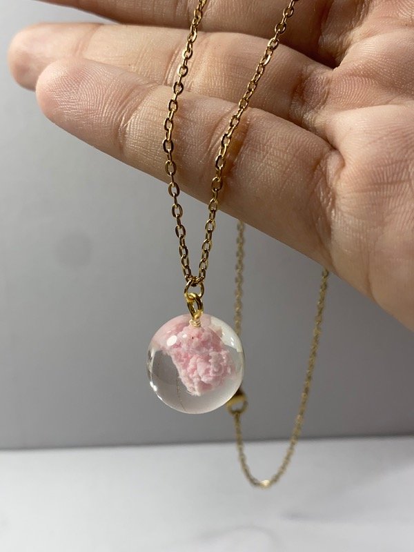 Producto - Co. Dije acrílico rosa