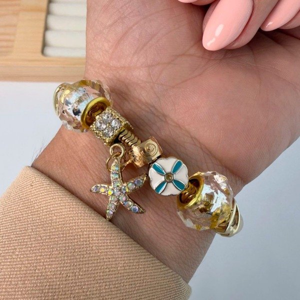 Producto - Pulsera Dupe Pandora dorado - Estrella de mar tornasol