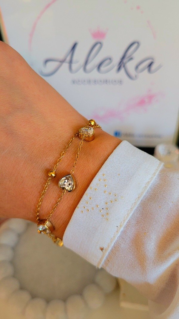 Producto - Pulsera doble cadena corazón de cubic de acero dorado