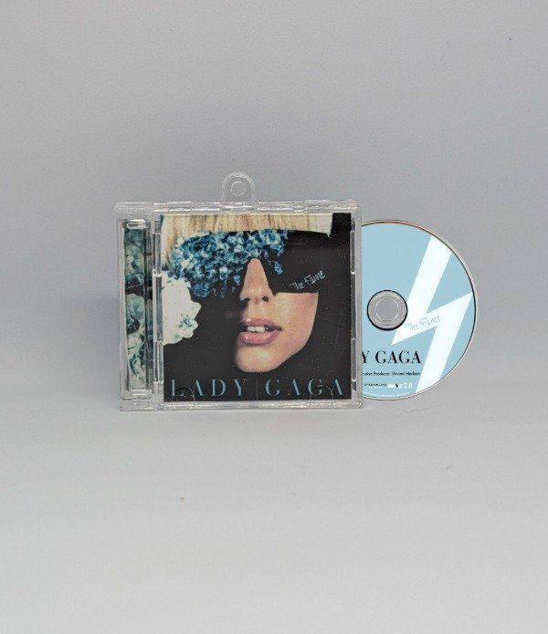 Producto - The Fame - Llavero CD
