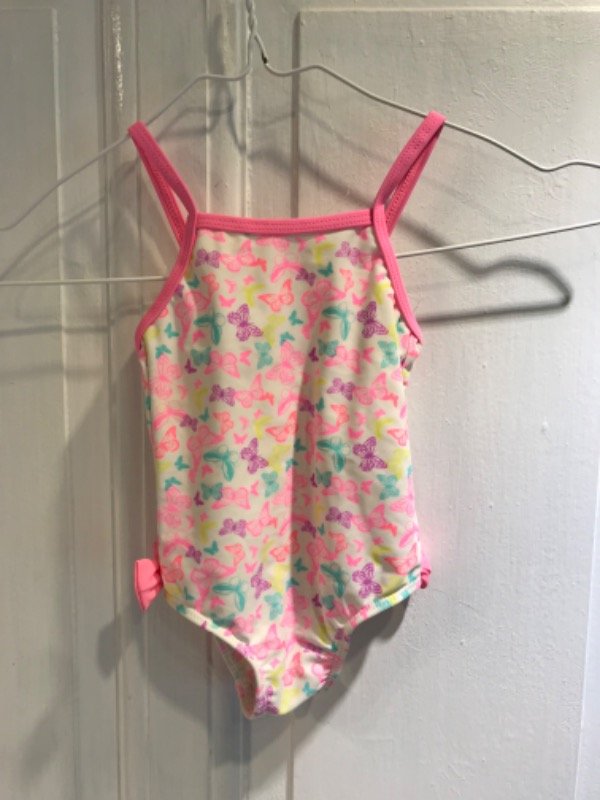 Producto - Traje de baño TRIBU mariposas  con moño y tiras rosas-Talle 12 meses- PRECIO: 9x