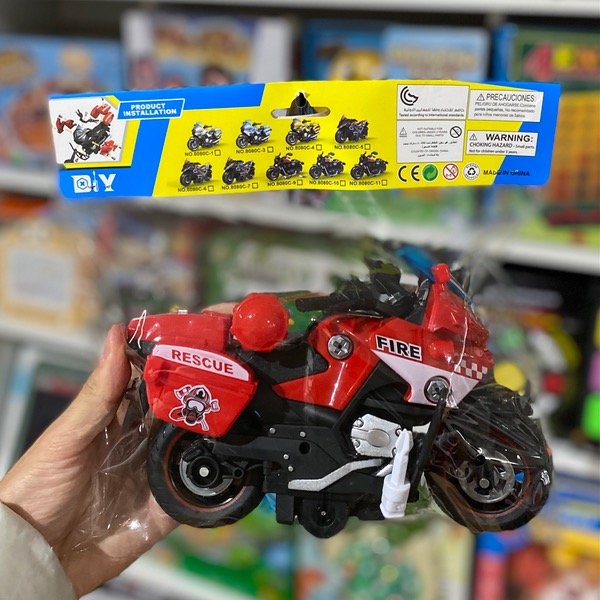 Producto - Moto De Juguete En PVC En Bolsita