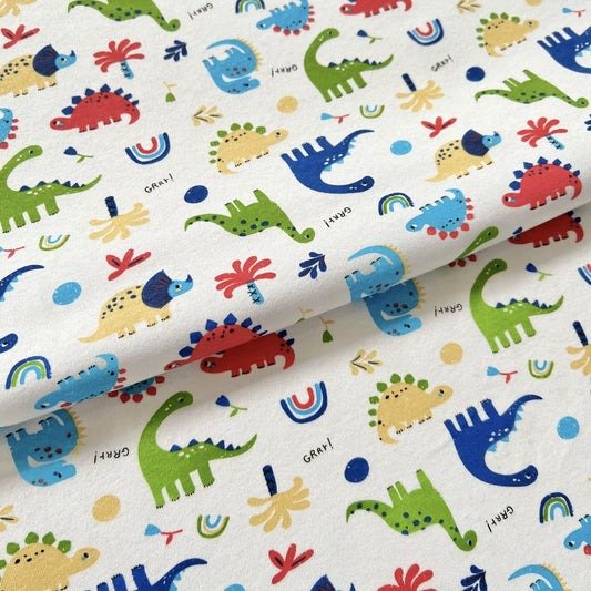 Producto - Interlock Dinos arco iris fdo blanco
