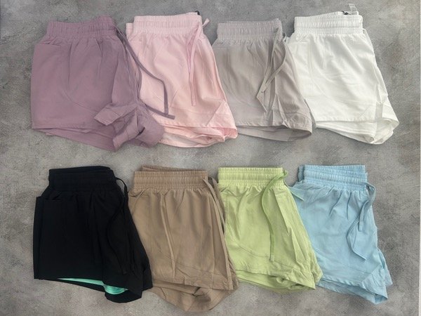 Producto - Short con calza henglumao bolsillo lateral ( 108 )