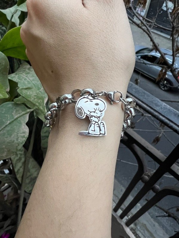 Producto - 2 pulseras rolo de acero dije de snopy
