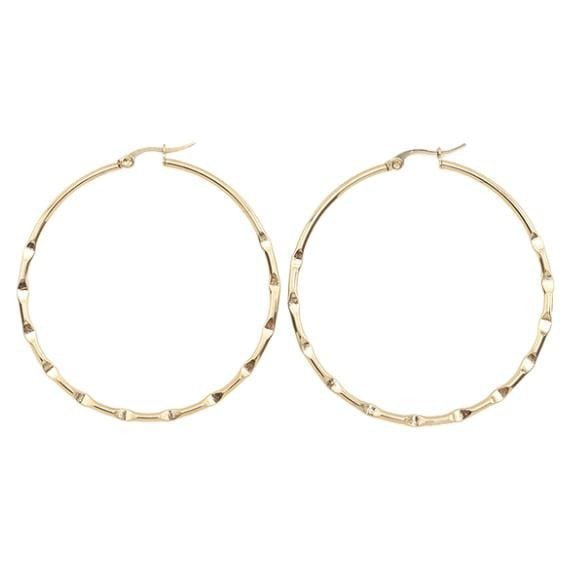 Producto - ARGOLLA ACERO DORADOS N50