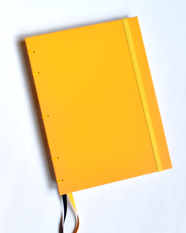 Producto - cuaderno A5 full amarillo