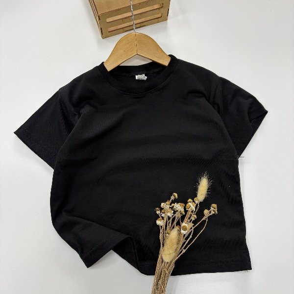 Remera over negra para niños hasta 16