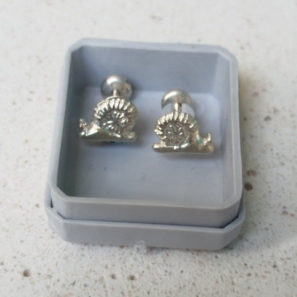 Producto - Abridor caracol