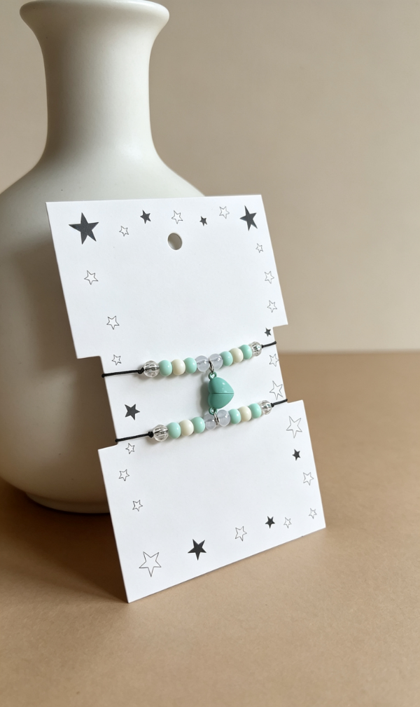 Producto - Pulseras compartidas con imán corazón verde agua