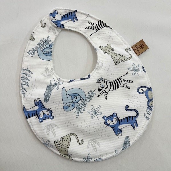 Producto - Babero impermeable selva celeste