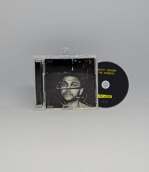 Producto - Beauty Behind the Madness - Llavero CD