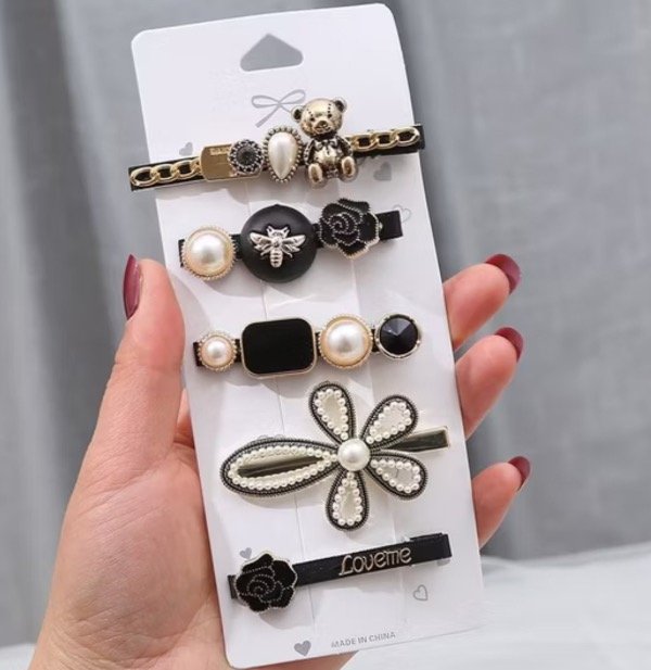 Producto - Set de hebillas negras/doradas