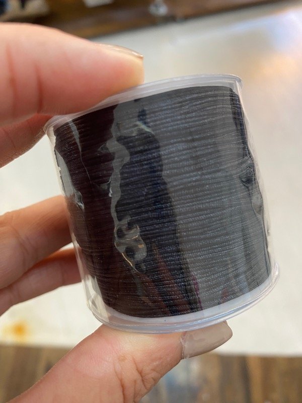 Producto - Hilo chino negro.