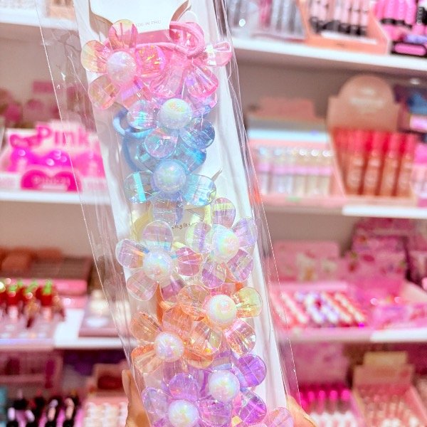 Producto - Colitas de pelo flor. El par