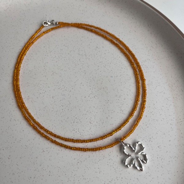 Producto - Choker Spyral Flor hawaiana - Naranja