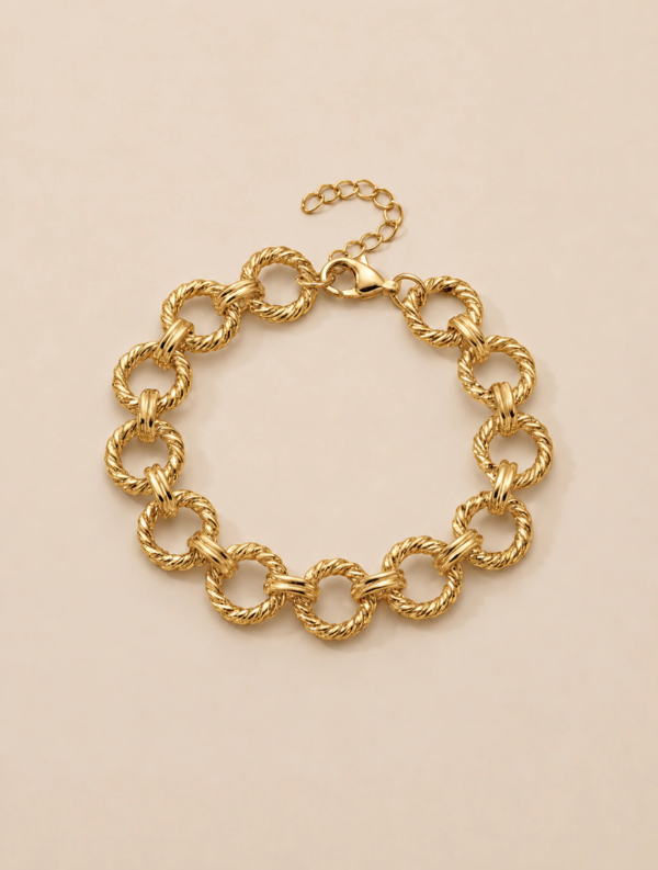 Producto - PULSERA ANNI TORZADA DORADA 16-20CM