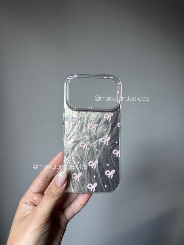Producto - Case nacarada moños iPhone