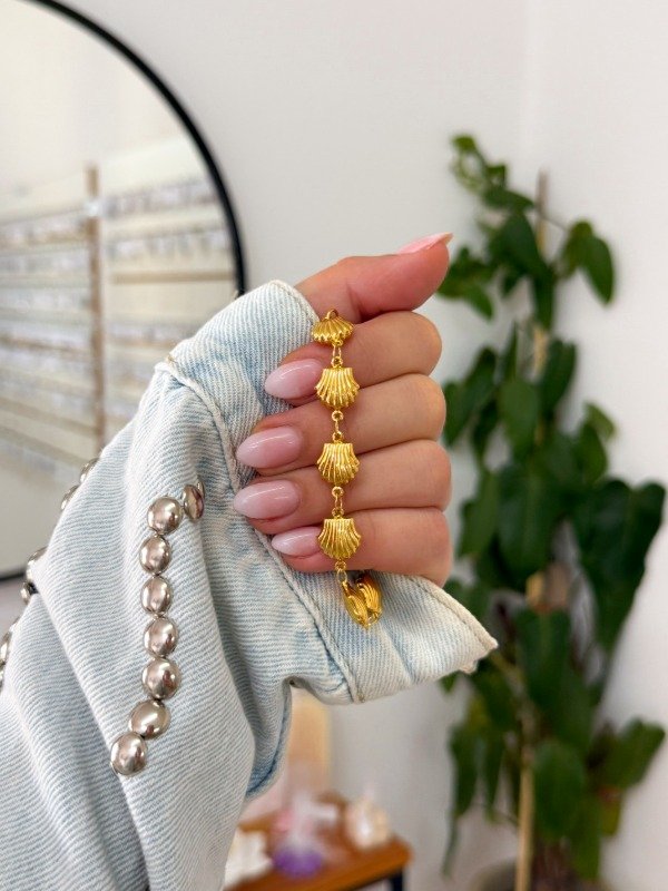 Producto - Pulsera acero dorado caracoles de mar