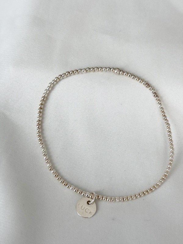Producto - Pulsera elástica LUCK