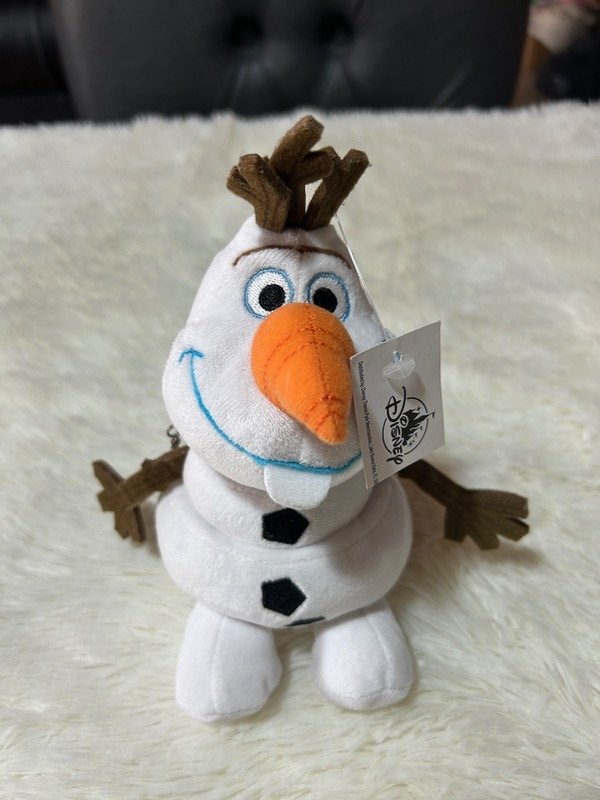 Producto - Carterita de mano Olaf