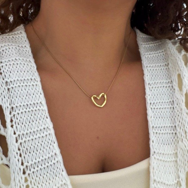 Producto - CONJUNTO DORADO CLAPTON CON CORAZON CALADO