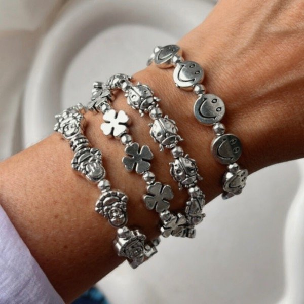 Producto - Pulsera Elastizada dijes carita feliz