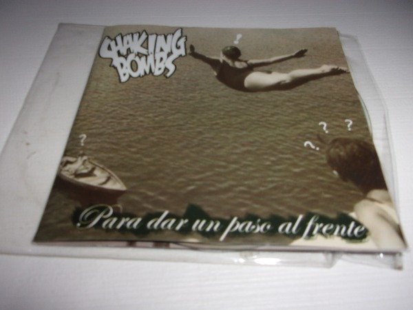 Producto - CD SHAKING BOMBS PARA DAR UN PASO AL FRENTE CD-R LEER 44A HARDCORE CHILE