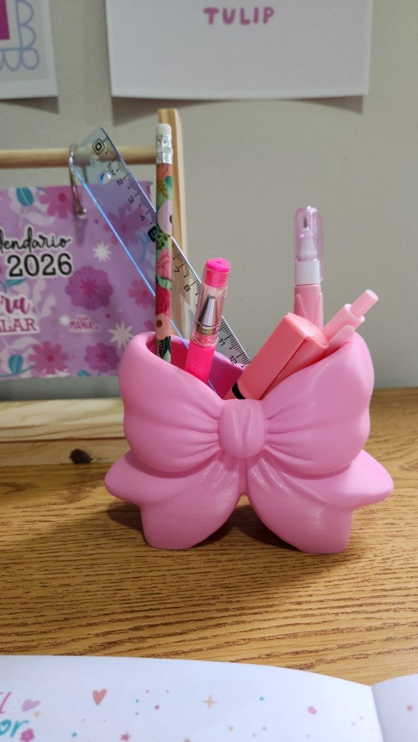 Producto - PORTALAPICERO MOÑO 3D ROSA