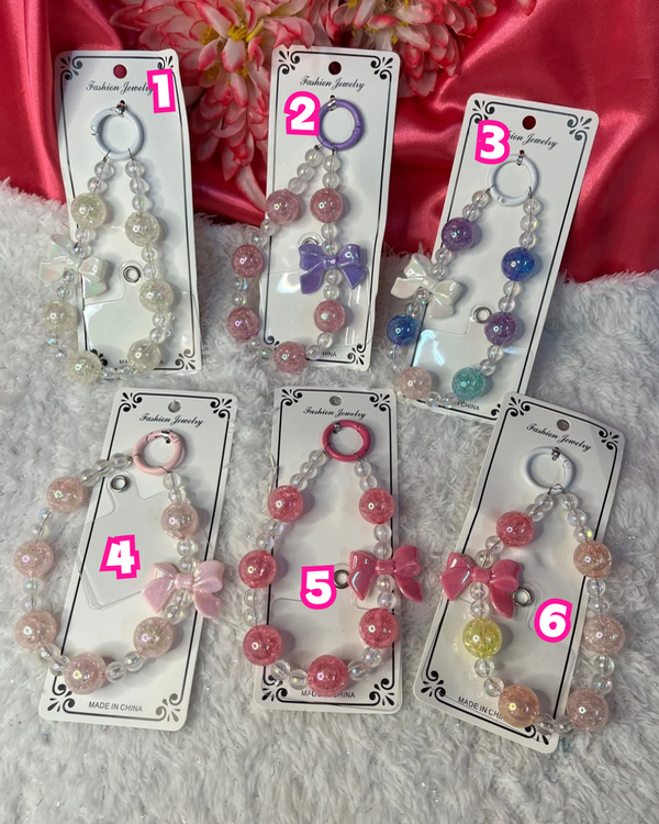 Producto - Llavero para celular pelotitas y moño