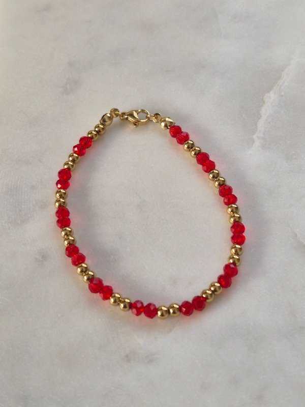 Producto - Pulse roja y dorada