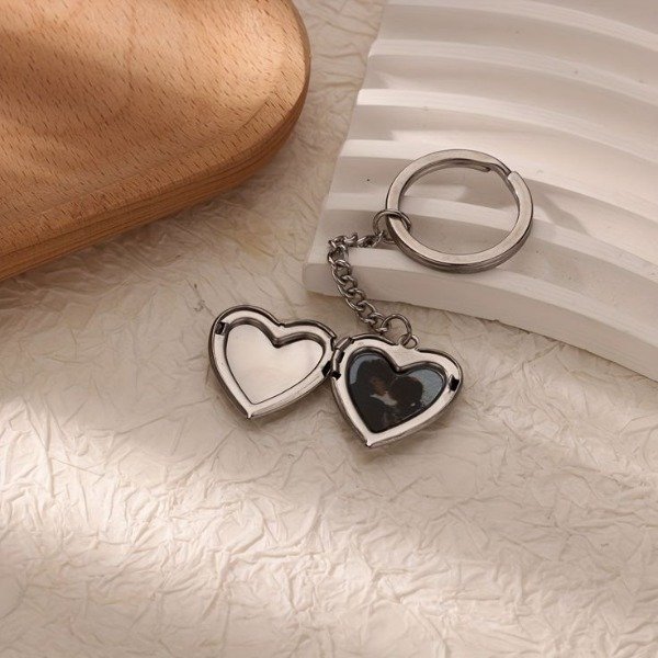 Producto - Llavero Relicario plateado
