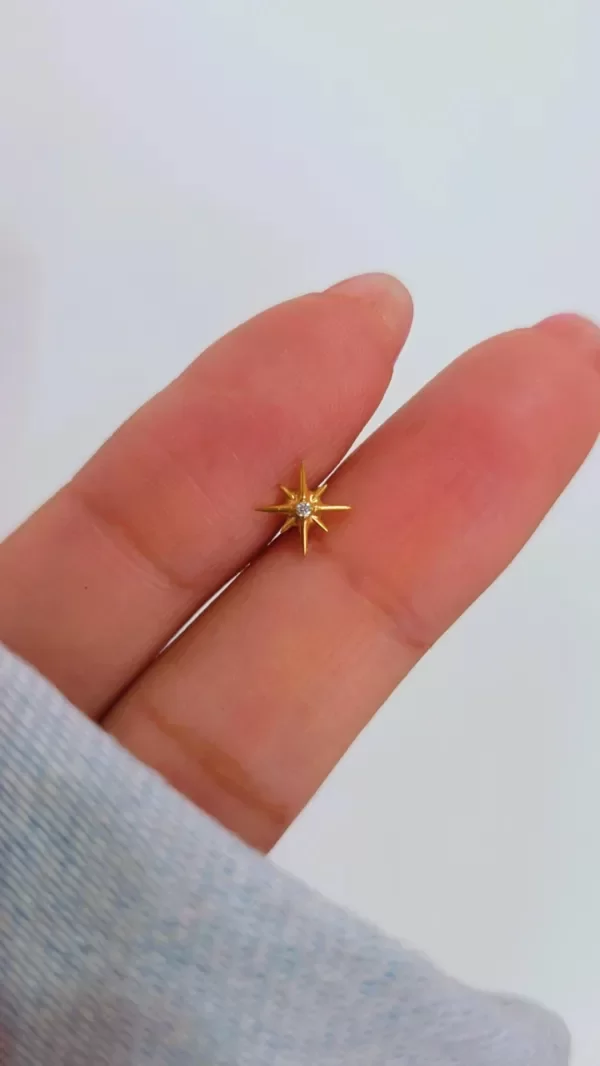 Producto - Piercing estrella TI dorado